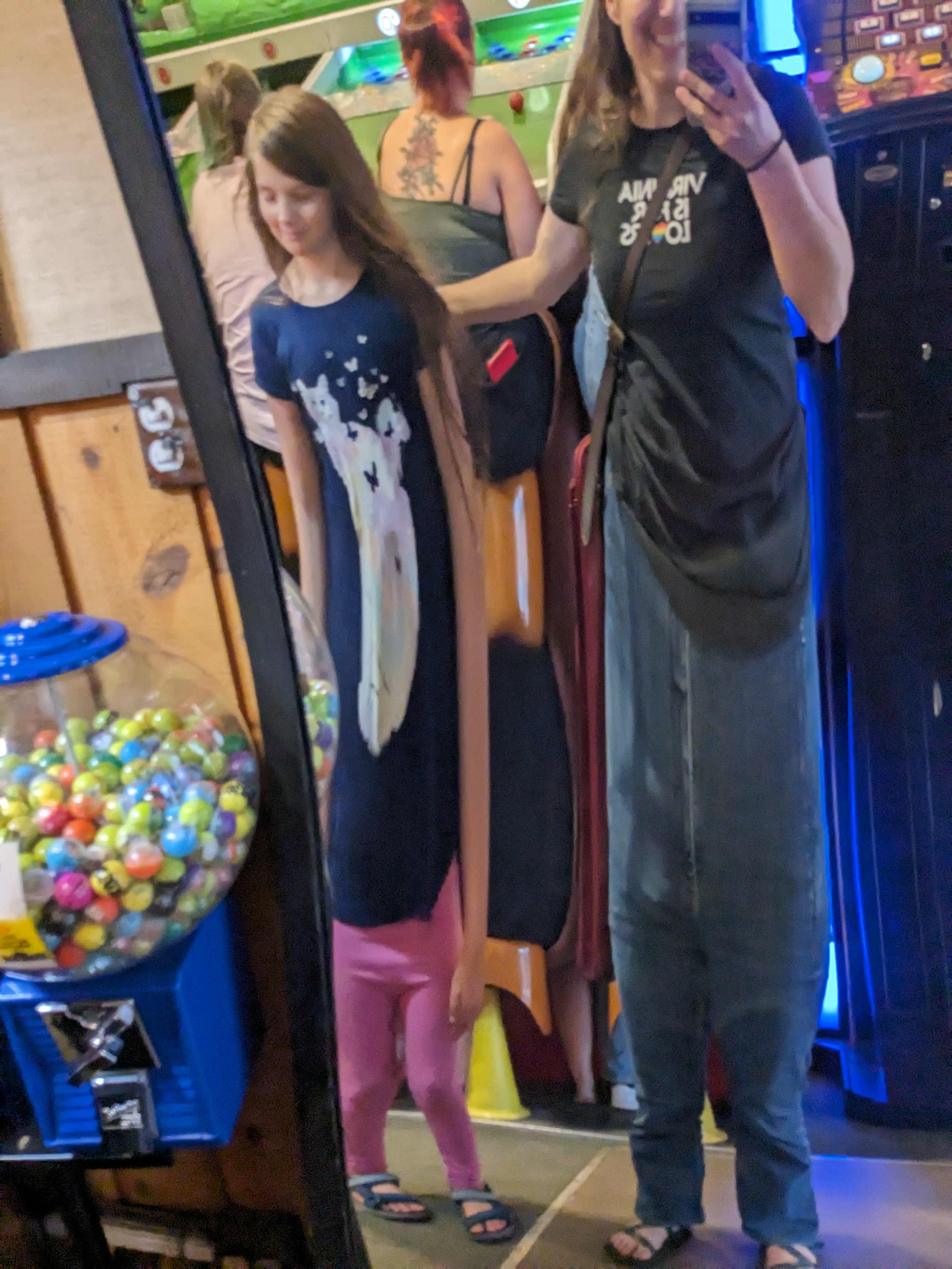Aili and Petra distorted in a funhouse mirror