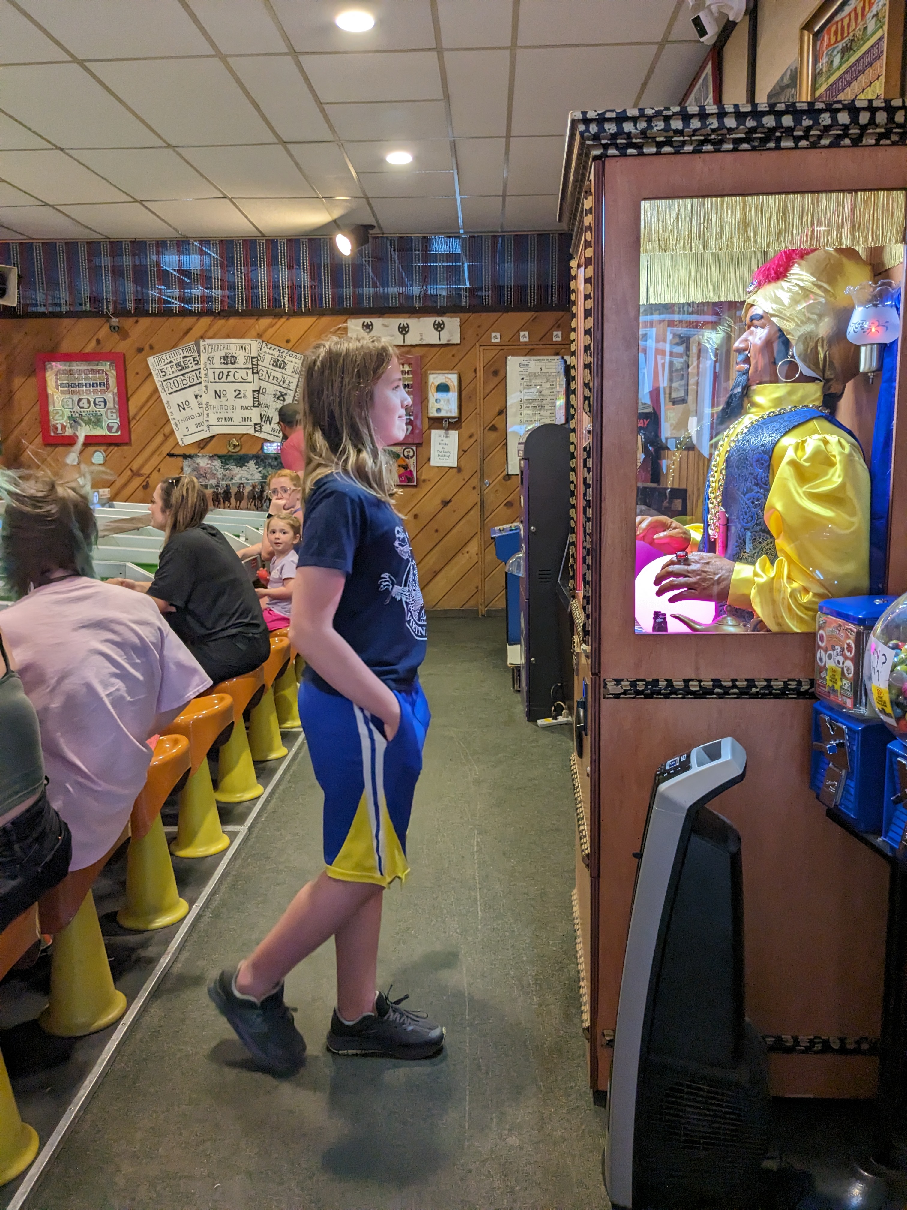 Silas examining the Zoltar machine